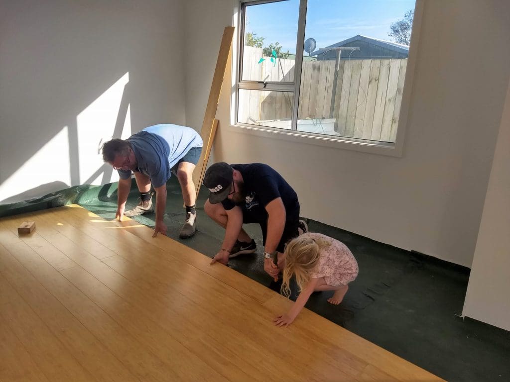 Family installs bamboo flooring